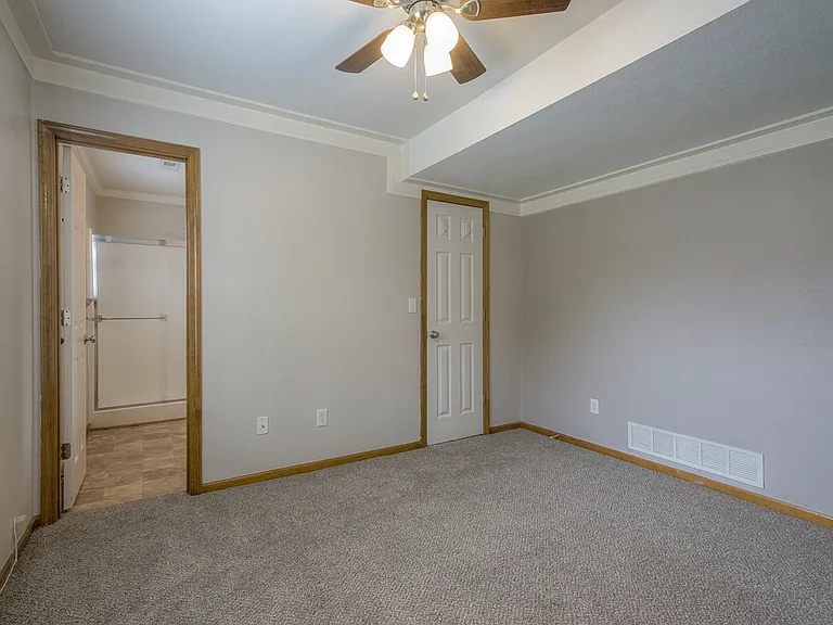 Crown molding in lower level bedroom