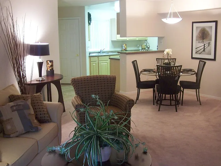 Large great room in 2-bedroom condo. Galley kitchen at far