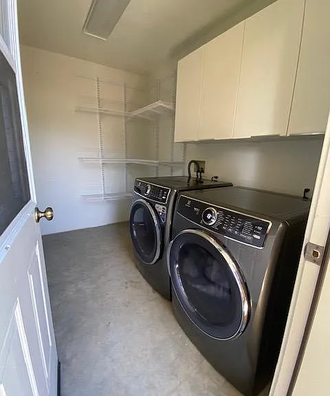 Secured laundry / storage room on ground level