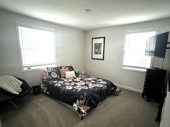 Large Primary bedroom with two nice windows for plenty of natural light