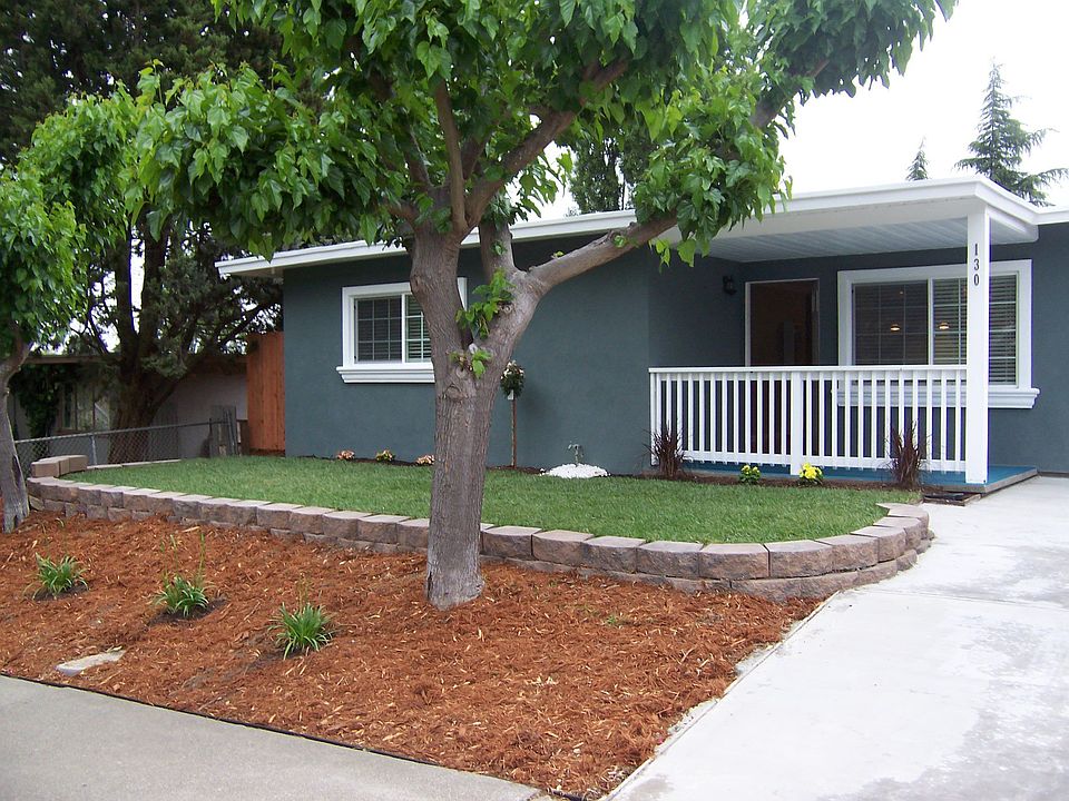 New stucco and landscaping