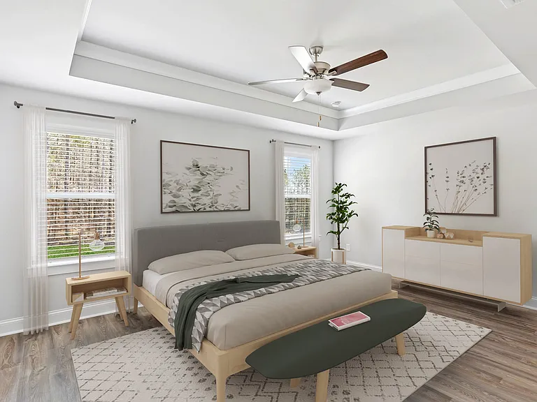 Serene primary suite with king bed, elegant finishes, and soothing greenery.
