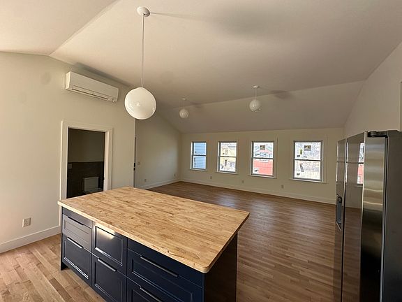 Entry - Kitchen, Living, Dining, and Half Bath