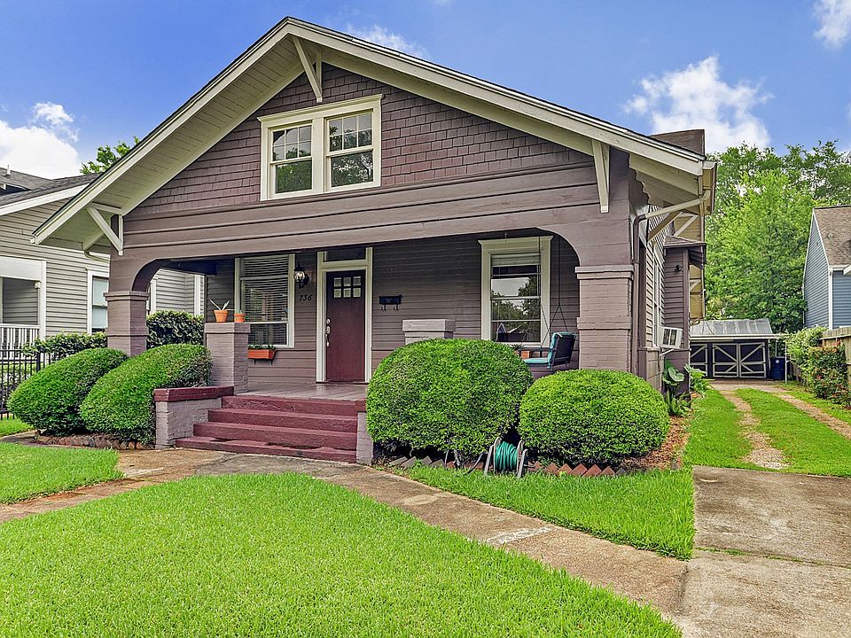 Step into this vintage Heights Bungalow with gorgeous landscaping and gated driveway and yard.