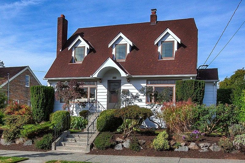 Lovingly cared for 1926 Ballard Craftsman first time ever on market! This 3 bedroom gem has tons of old world charm-built ins cabinets, coved ceilings with picture rail moulding, beautiful & original lighting fixtures and more. Very nice floor plan with generous room sizes, gleaming hardwoods & original fireplace. Professionally landscaped yard is fully fenced with a large, 2 car garage off the alley. Located within Whittier Elementary reference area. Blocks to nearby coffee and restaurants.