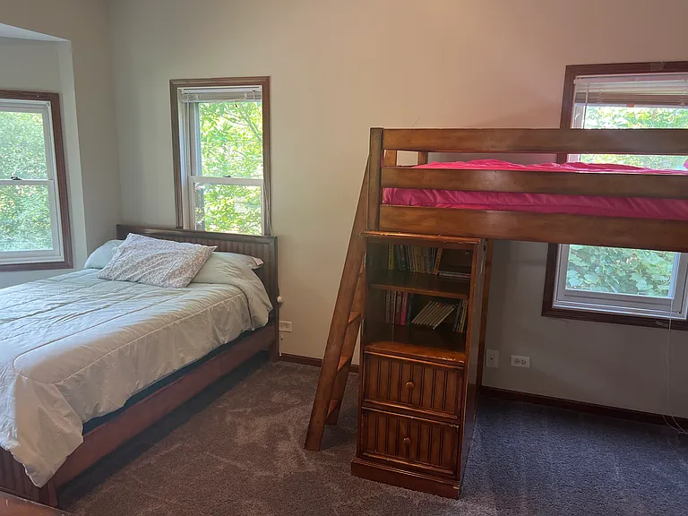 Bedroom # 4 Full size bed with twin and storage areas. Two Dressers and walk-in closet. Lovely Bay Window as well. Beds and furniture can be changed upon request.
