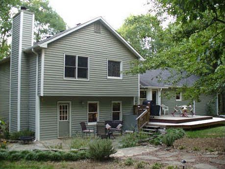 the backyard features 3 entertaining areas!