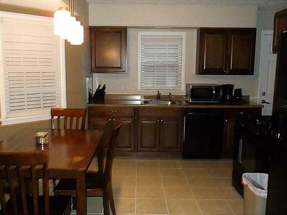 Kitchen. UPDATED KITCHEN WITH NEW CABINETS, APPLIANCES STAY.