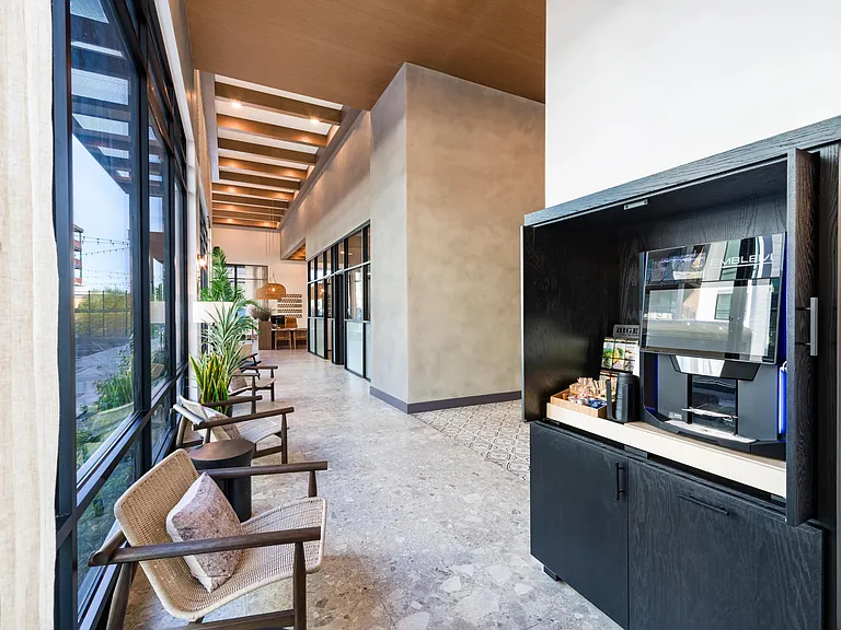 A thoughtfully designed coffee bar at Modera Higley Commons, offering a polished place to pause, recharge, and ease into the day.
