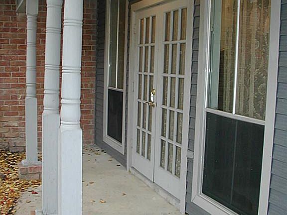 Long side porch on left of front door. Long elegant hallway runs the same length of this wonderful p