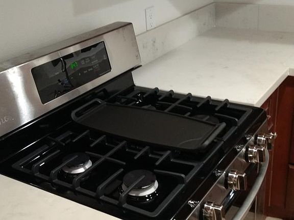 Newly remodeled kitchen with new stainless steel gas range