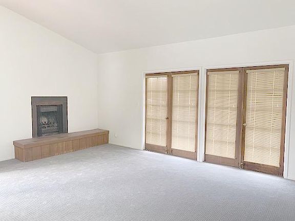 Living Room with Decorative Fireplace