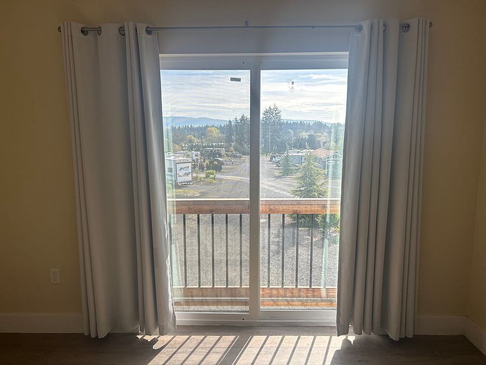 2nd image of 9750 NE Fox Farm Rd APT 1