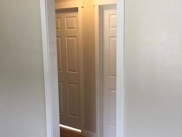 Hallway to bedrooms and bathroom