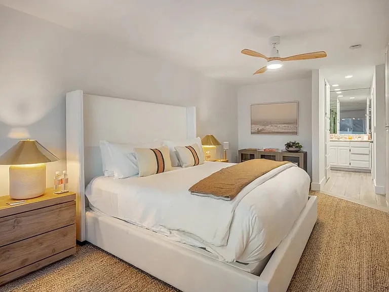 Experience serenity in the bedroom retreat, boasting ensuite luxury and opulent linens.
