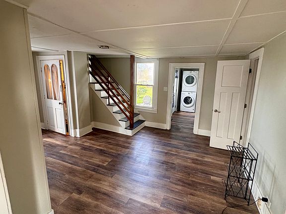 Dining room area. Taken after new flooring installed in April, 2025.