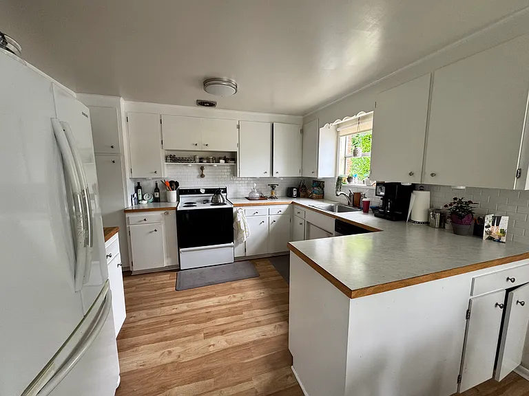 Large kitchen with peninsula, view from the dining room