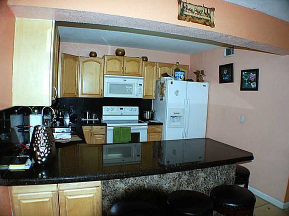 3rd image of 6710 W 24th Ct Unit 26-104