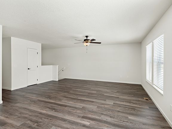 The family room is spacious and has plenty of light