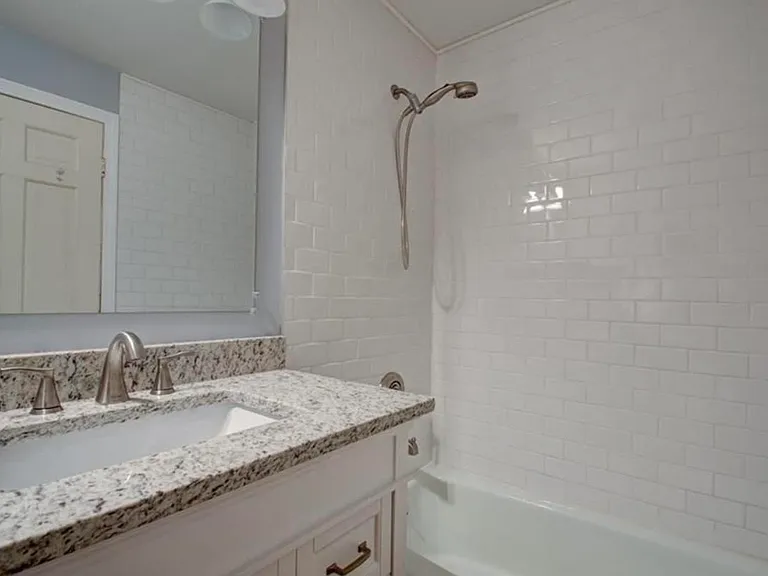 classic subway tiled bathtub.