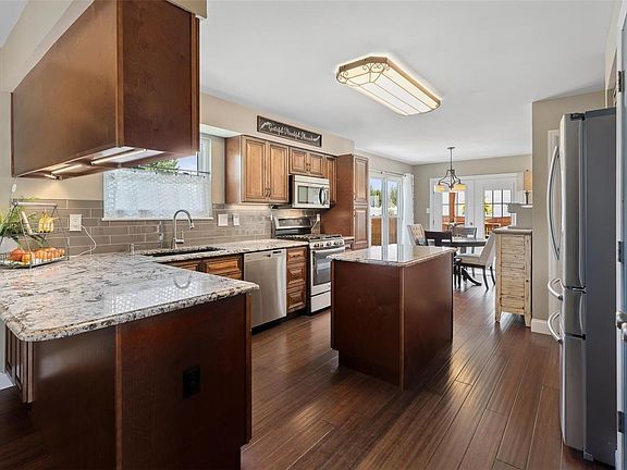 You will love to show off your cooks dream kitchen with a breakfast bar opening to the great room, extending your entertainment possibilities and providing additional counter space.