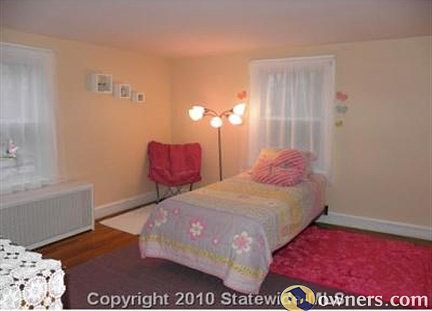 one of three bedrooms