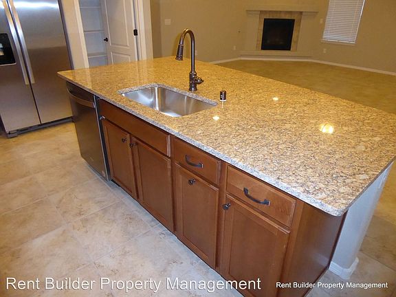 4th image of 9028 Wind Caves Way NW