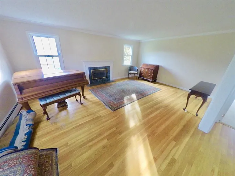 First floor living room with working fireplace