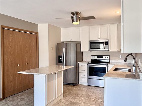 3rd image of 6410 Creekside Dr NE Unit 2