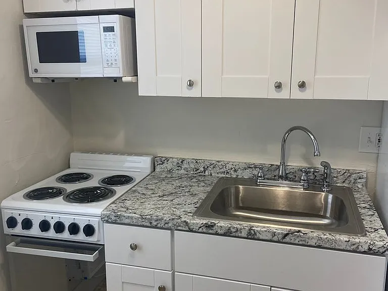 GEM COVE APARTMENTS — Photo 11
