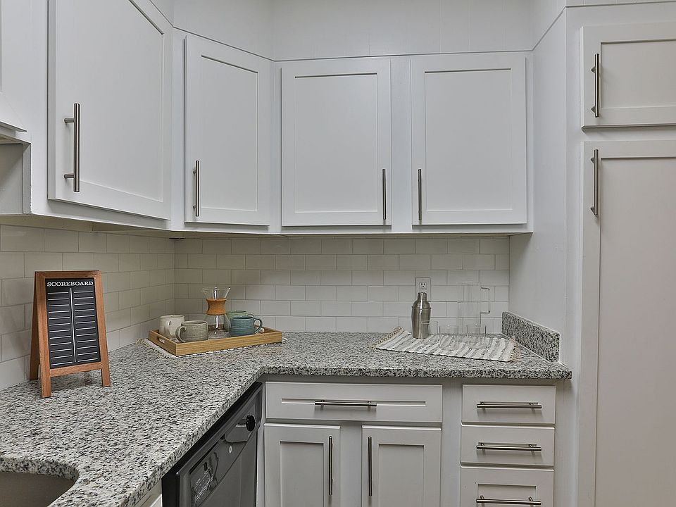 Kitchen with granite counters and modern cabinetry