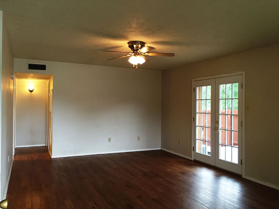 Ceiling fans in each room. French door lead to your own personal covered Deck with built in seating. Lots of natural light. Beautiful floors, neutral colors