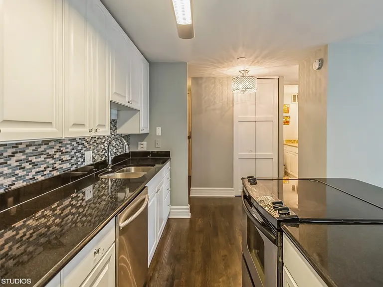 Kitchen with granite countertops and stainless steel appliances