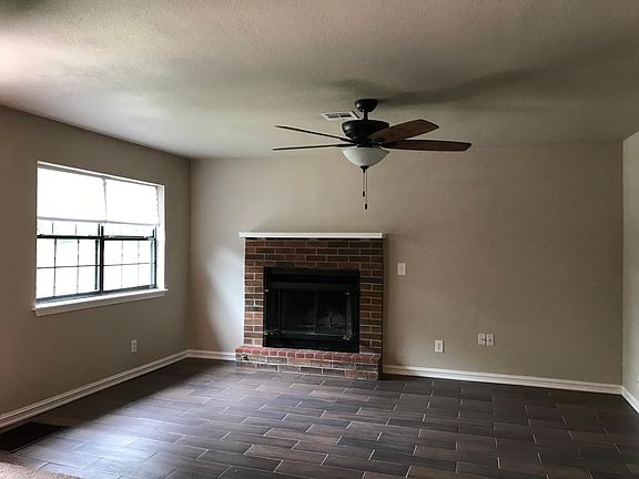 Living room close up picture with working fireplace.
