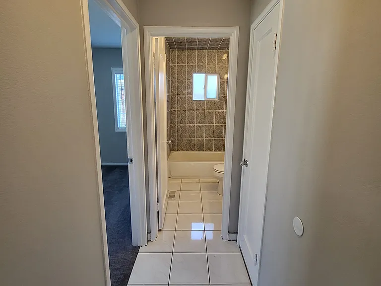 Hallway to bathroom and bedroom #2.