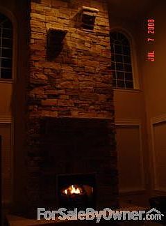 Stone fireplace
						:
						floor-to-ceiling dry stack stone