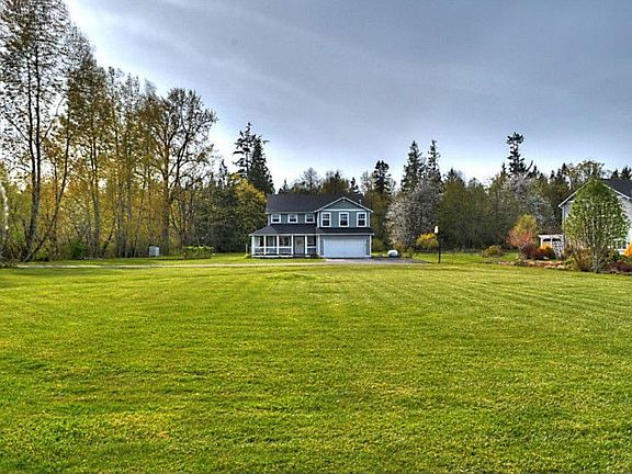 Expansive yard and privacy throughout