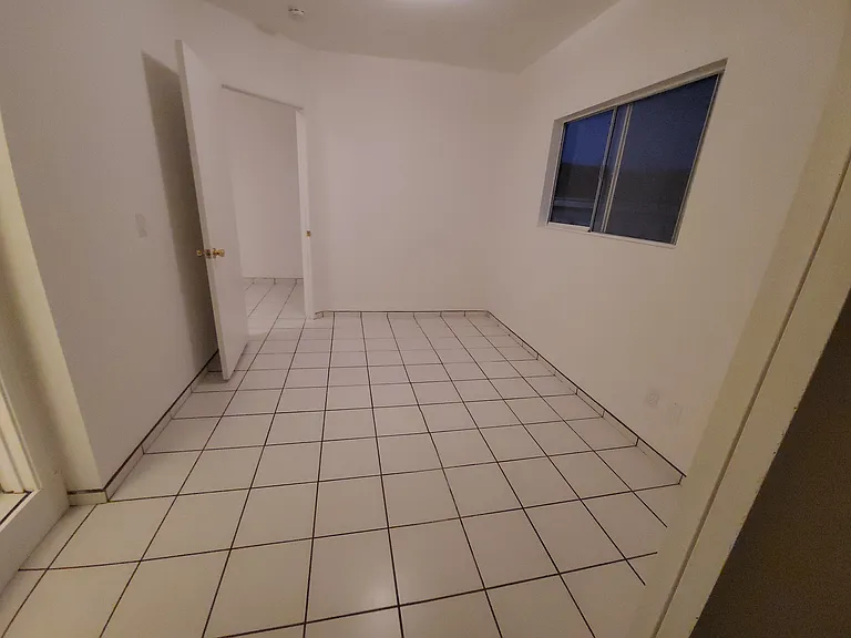 Bedroom looking towards entry
