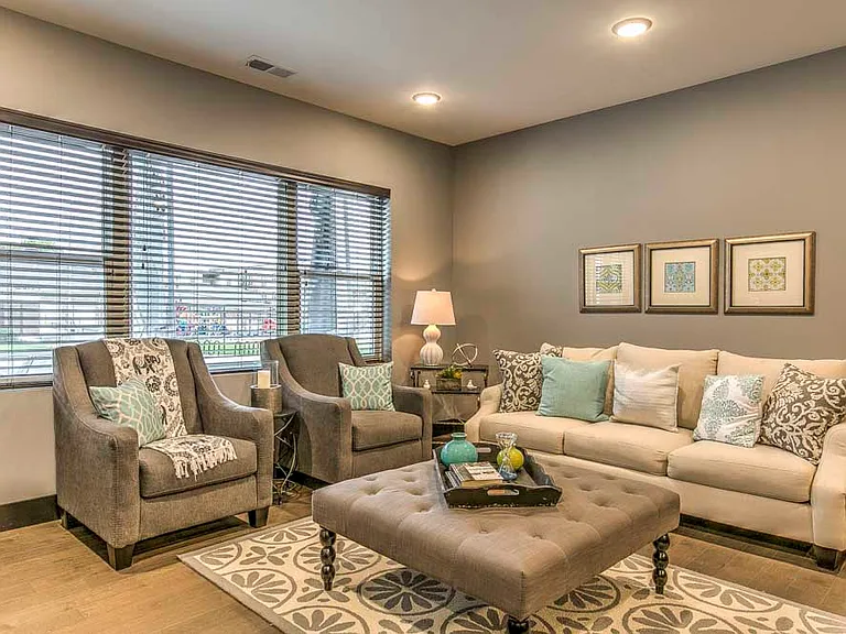 Spacious and open, our living areas are filled with natural light, creating a warm and inviting atmosphere.