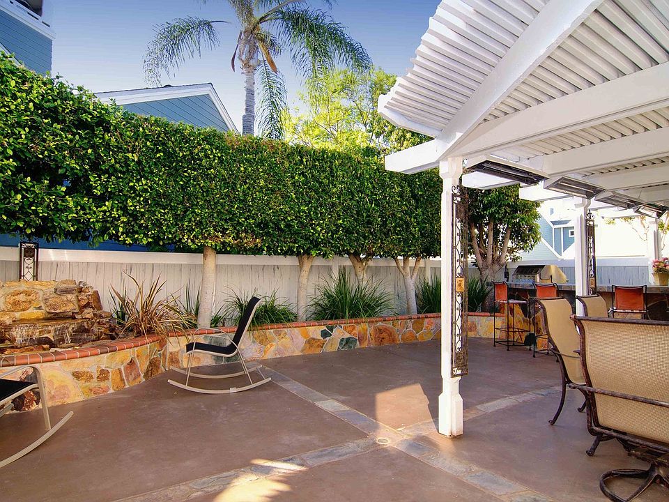 Fabulous Backyard with fountain, heated seating, Built-in BBQ & More!