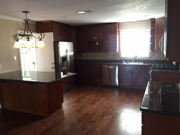 View of Kitchen with all new cabinets, appliances and wood f