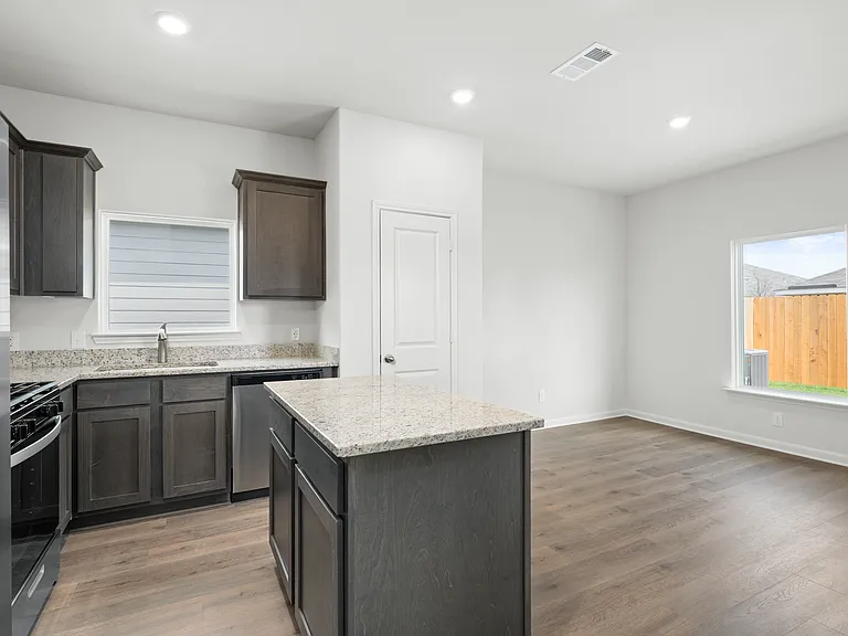 The dining room sits right off of the kitchen.