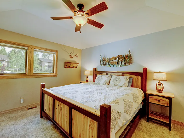 Master bedroom with king sized bed.