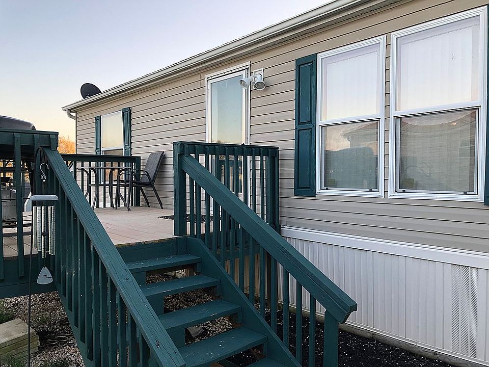 Front of house with deck.