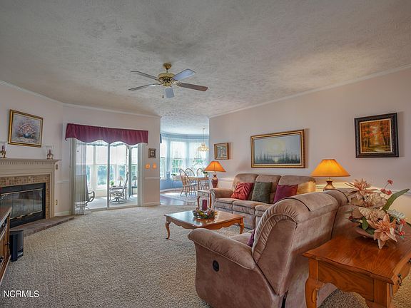 Living Room from Foyer. Enclosed patio out sliding doors