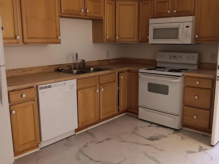 Large kitchen with dishwasher.