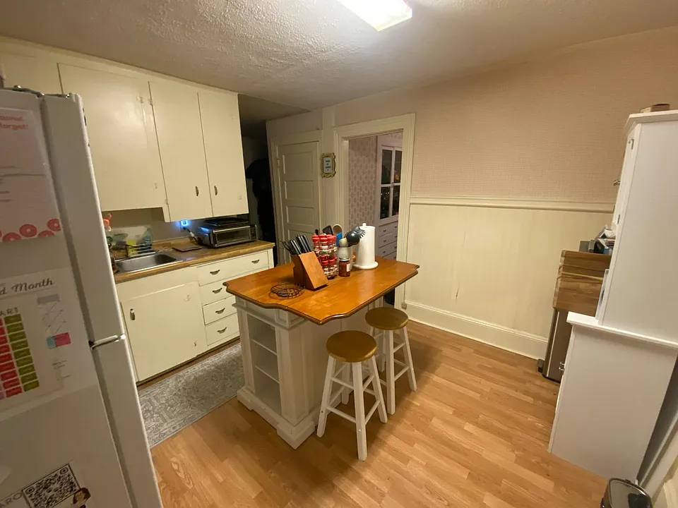 Kitchen island stays with apartment.