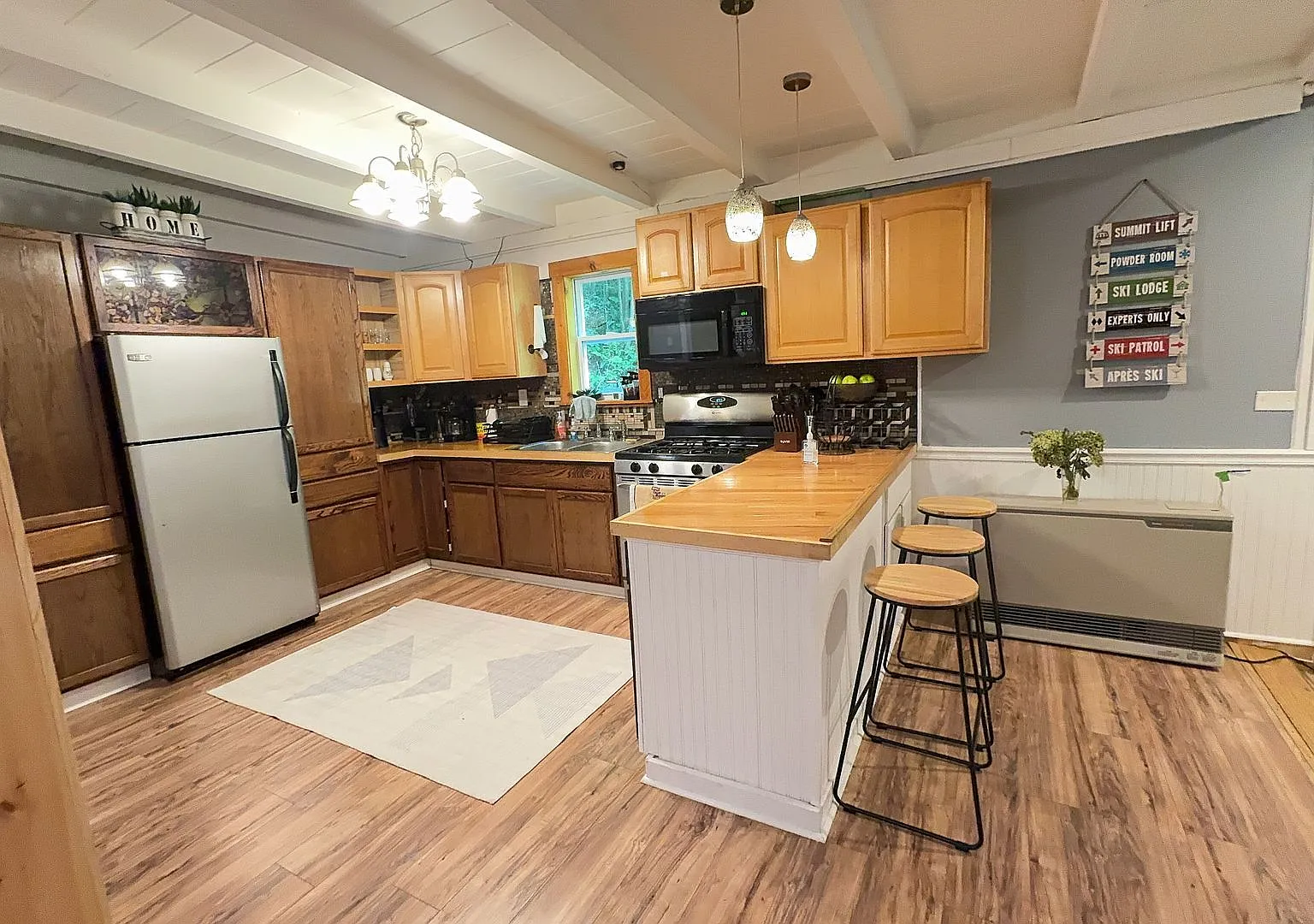Beautiful Furnished Home with Cozy Rustic Finishes — Photo 1