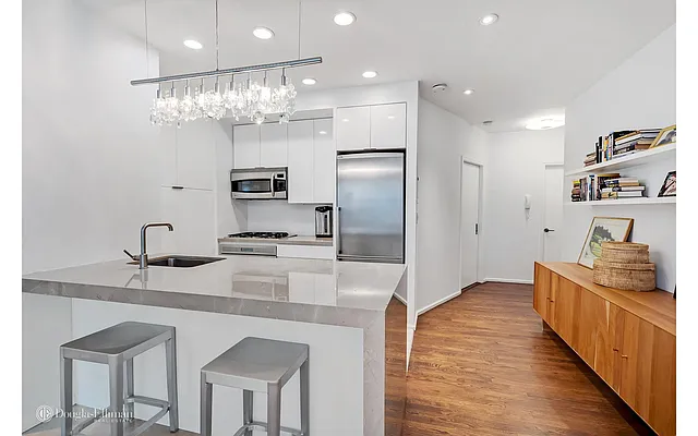 Sold by Douglas Elliman | media 12