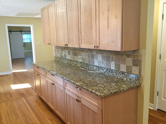Granite countertops with plenty of working space.